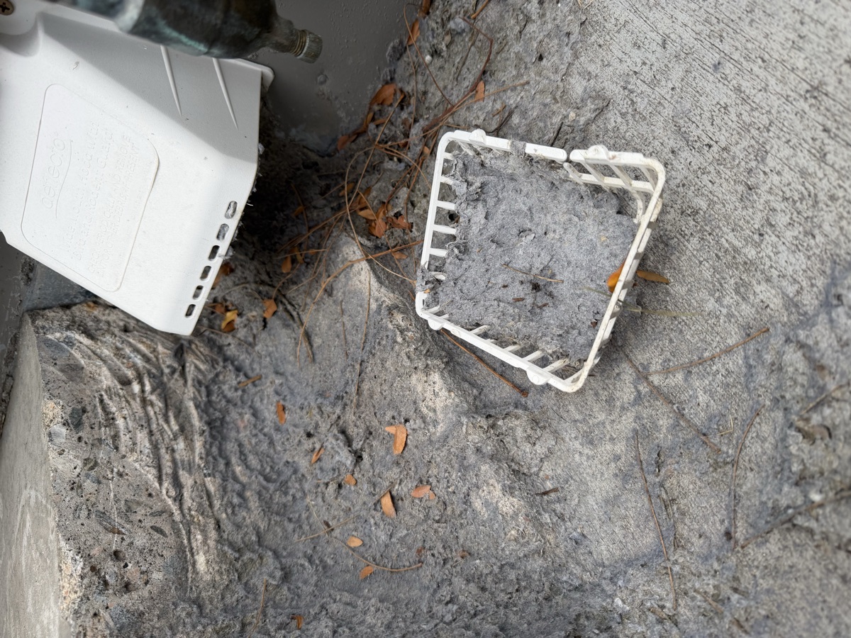 Dirty dryer vent cover with lint