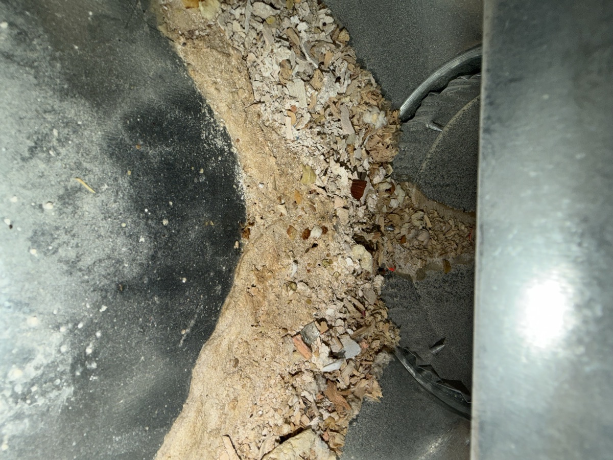 Heavy debris buildup in main duct